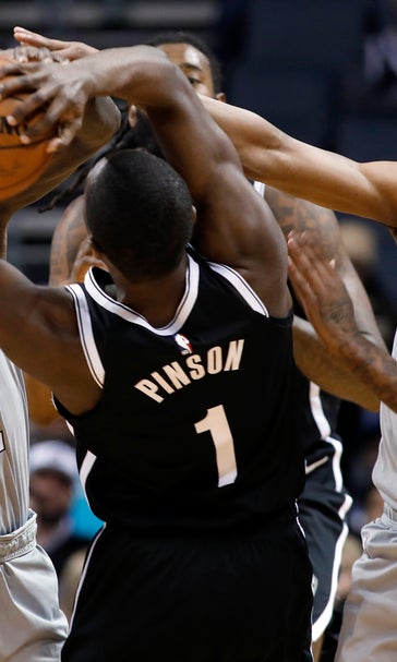 Harris, Jordan lead Nets past Hornets, 111-104